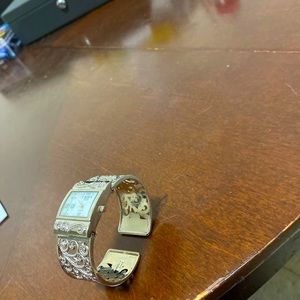 Silver bangle watch